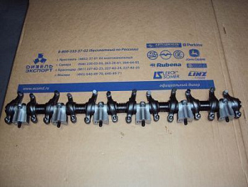 536.1007090 Ось с коромыслом и стойками 